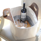 Inside of Eva Signature Food & Picnic Tote with removable cutting board, spill-proof lining and wine strap